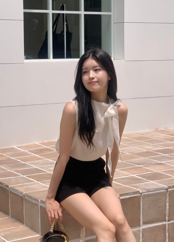 Tie Neck Sleeveless Blouse – Soft Feminine Silhouette