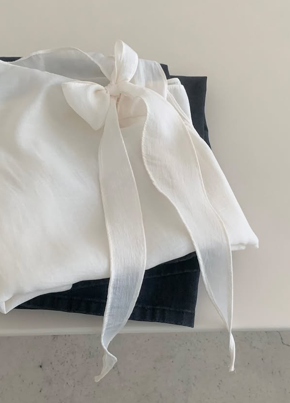 Tie Neck Sleeveless Blouse – Soft Feminine Silhouette